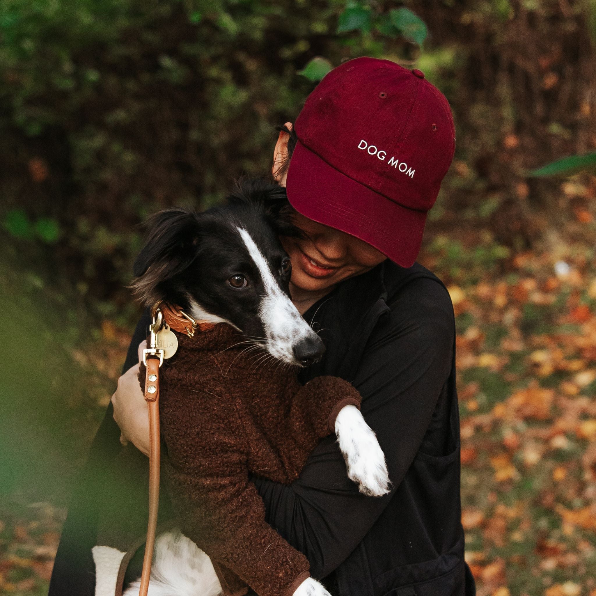 burgundy-denim-cap-dog-mom-woman-wearing.jpg
